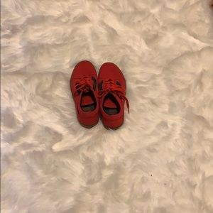 Red vans with black stripes